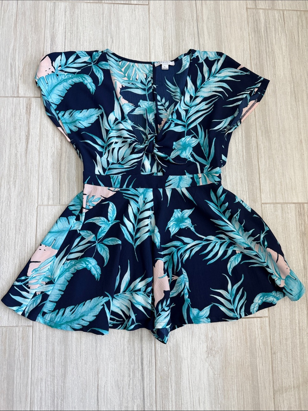 Navy Tropical Leaf Romper with Aqua Accents large floral vacation trip tie front